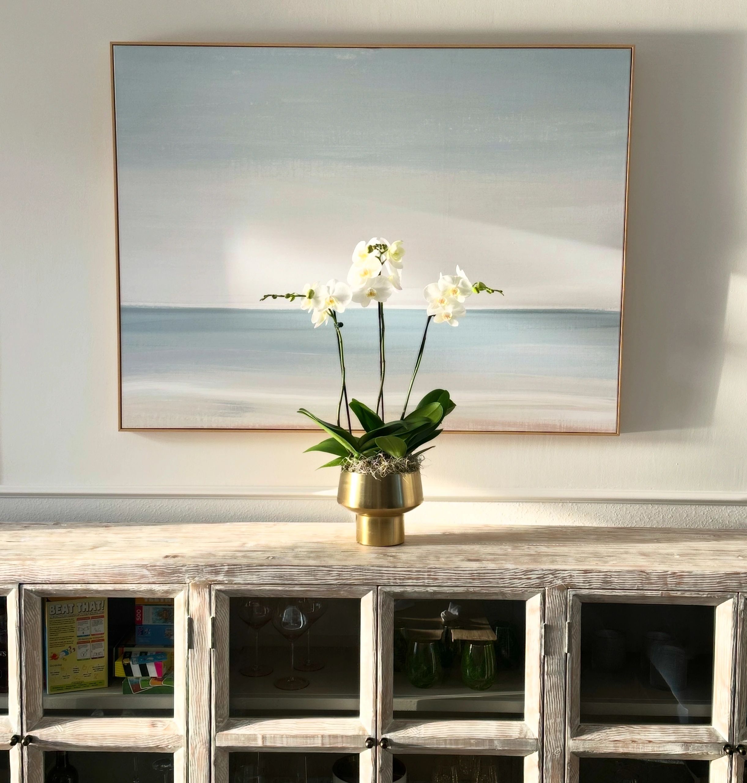 Potted orchid arrangement built to fit a customer's vessel in Sarasota