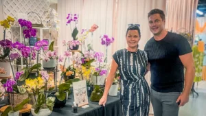 Justin and Alicia, owners of The Orchid Lady Sarasota, in the shop